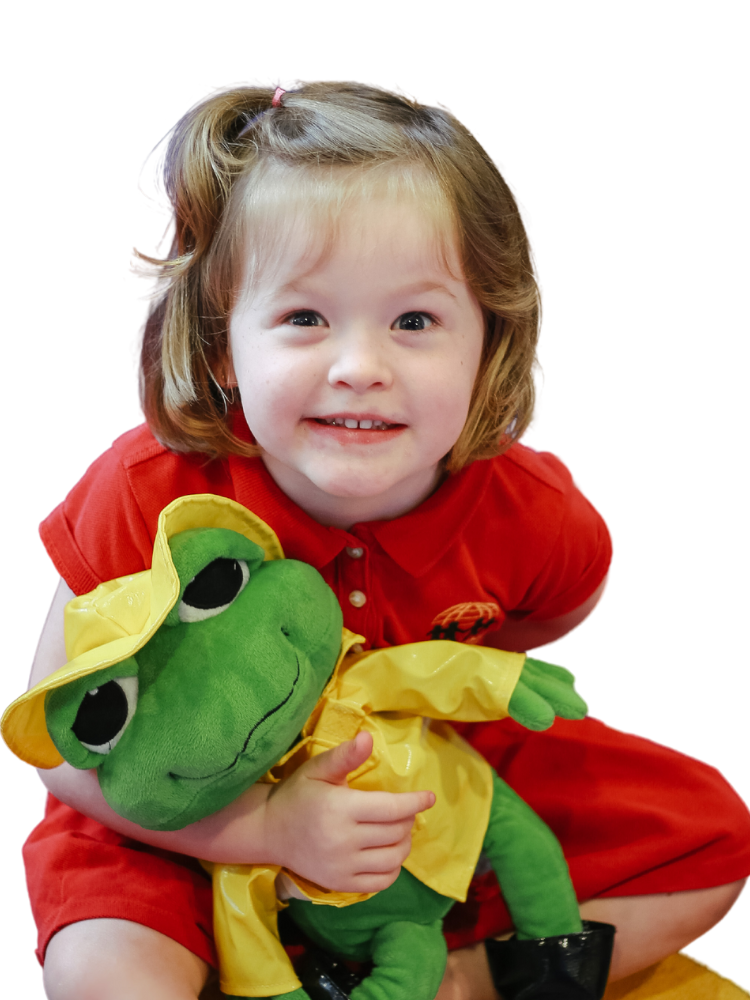 A collage of four smiling children, each with unique expressions and colorful backgrounds showcasing their personalities.